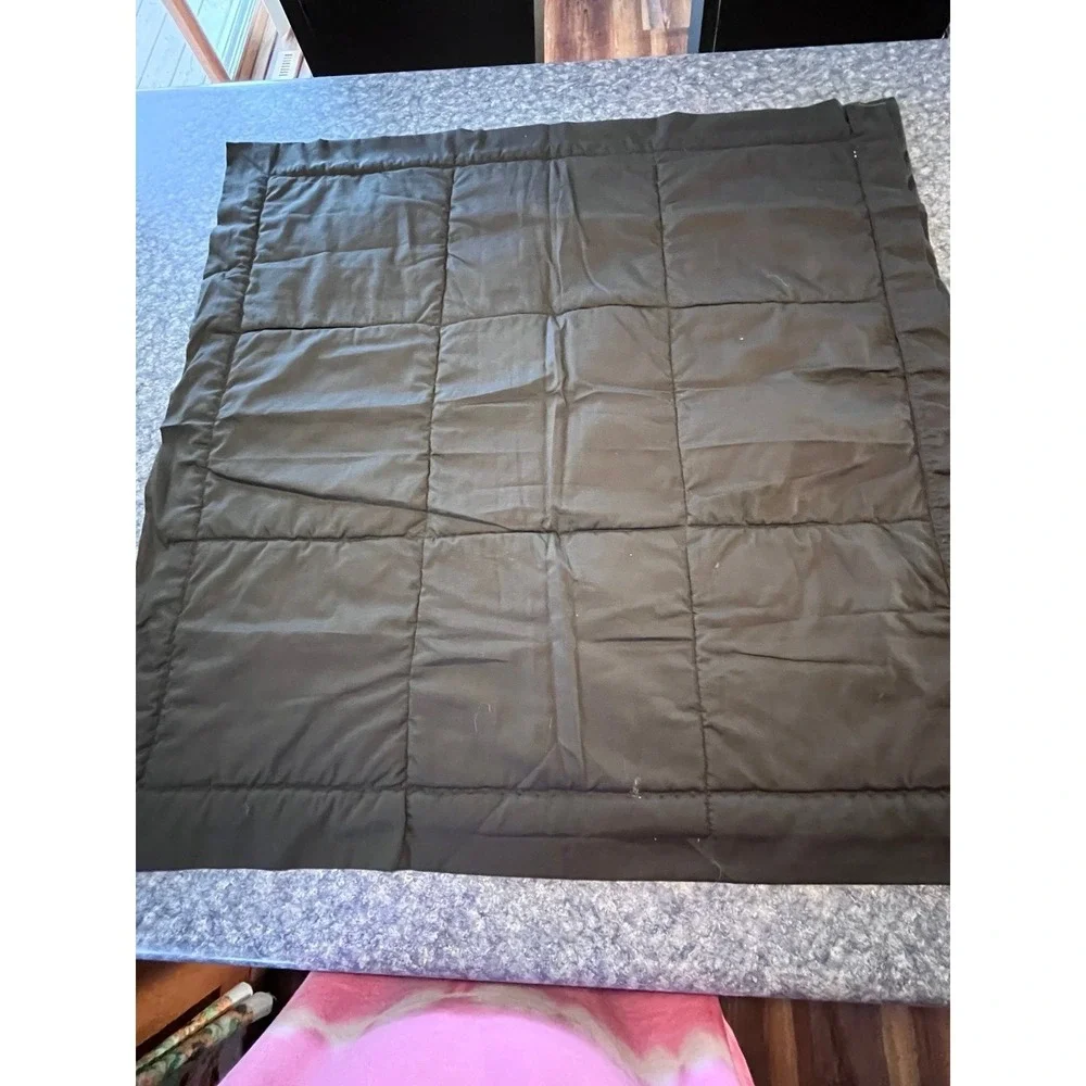 Black quilted wall hanging featuring colorful frogs 29x29